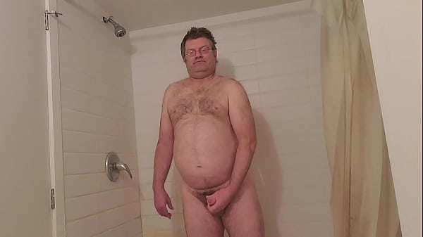 Long masturbation, ejaculation in his own hand and finally sperm eating  by naked Martin Lavallee who stands in his shower
