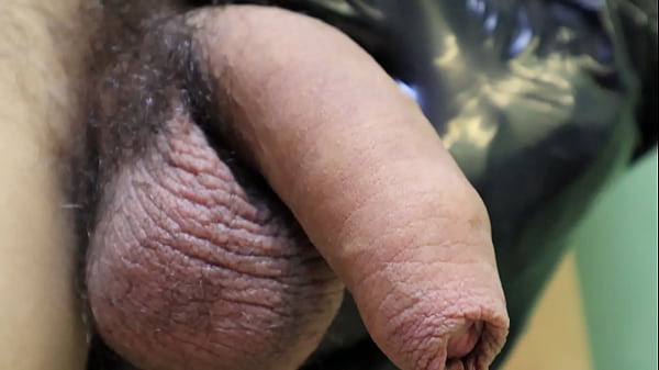 fetish in gloves close-up leaking a lot of lube from the red head