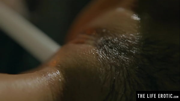 Watch her oil up her big natural tits as she masturbates wildly