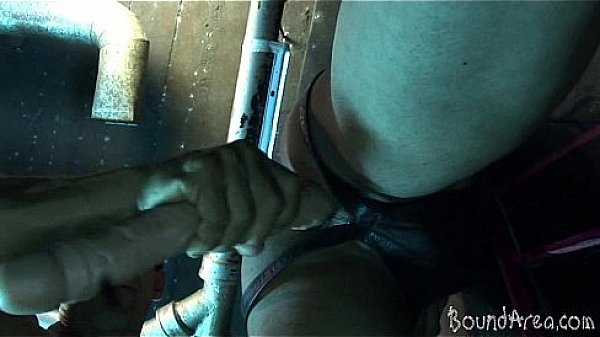 Young bound hunk works his sorry mouth and butt  