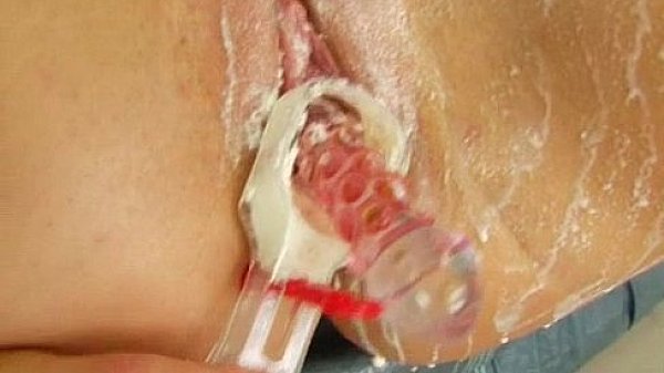 Give Me Pink Girl rubs oil on boobs and masturbates with a lollipop