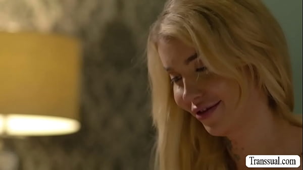 Busty Tgirl Gracie Jane and her new lover Roman Todd are on the bed kissing each other so hard 