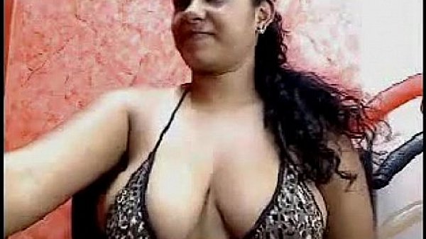 Chubby Girl Teasing Her Large Breasts