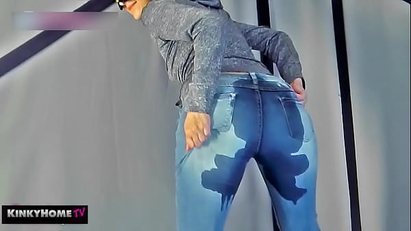 The girl pissed herself into jeans.