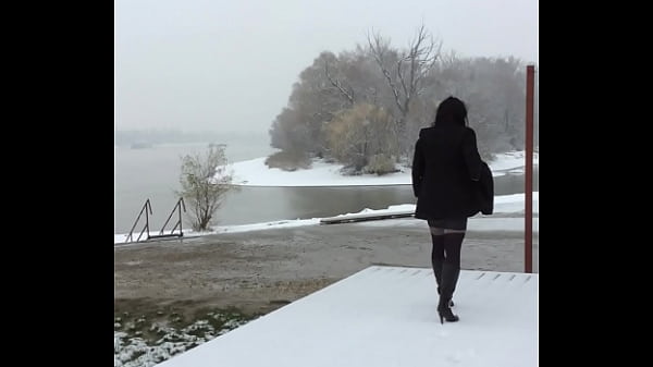 Crossdresser uotside at winter again an ather place 
