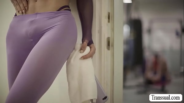 Horny Whitney caught by TS Jade Venus sucking Roman Todds big cock in the gym.Instead of getting mad,TS Jade ties up Whitneys hands and lets her watch them.Roman bareback fucks Jades tight wet ass so deep and hard. 