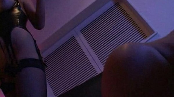 Slave is in total pain during a wax play by mistress  