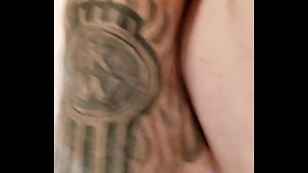 Bent over the kitchen counter