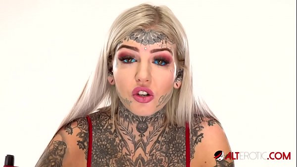 Amber Luke aka Blue Eyes White Dragon gets a new 666 face tattoo!  