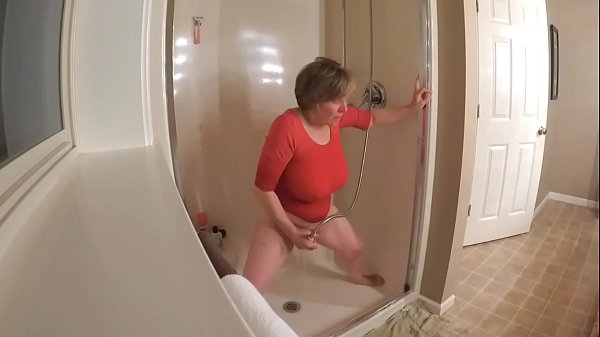 60  GILF masturbating in wet t-shirt