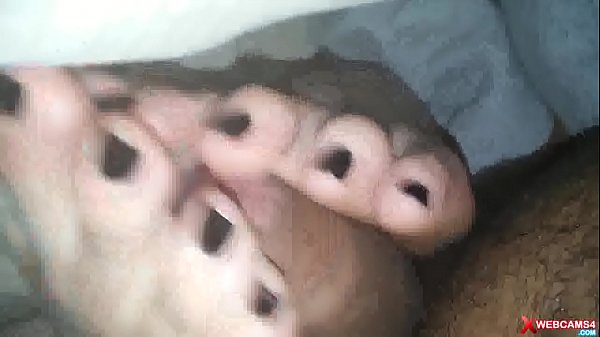 Couple footjob cuming in the webcam