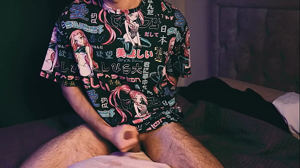 a young guy in an anime t-shirt masturbates loudly and smears his pillow with sperm. 4K VIDEO