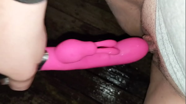 Nasty young whore making her pussy gush like a fountain outside and can't get enough 