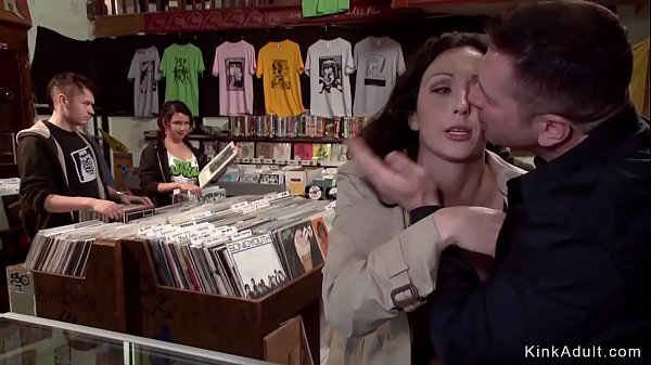 Beautiful dark haired European slave sucks big cock in public  