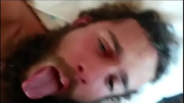 Bearded dude gets shot in the face with jizz from his buddy.