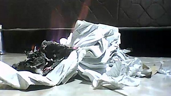 destroying bible with feet