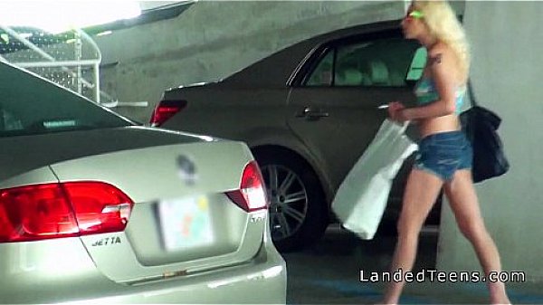 Dude fucking busty teen in a public garage