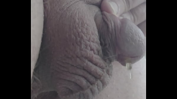 Closeup pissing tiny dick