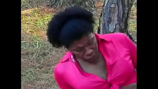 Black shemale whore with long dong rides slender cock by asshole at the wood 