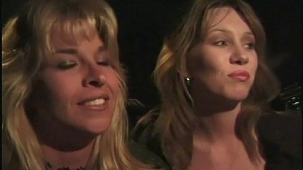 Two woman having sex in the cab