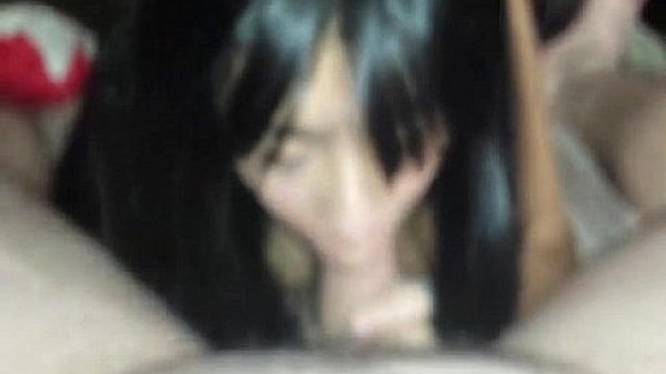 Asian amateur deepthroats a white cock looking sexy