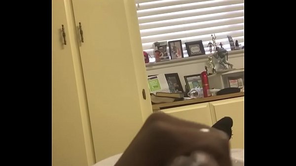 Black man stroking his cock