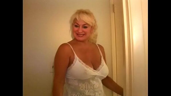 A mature blonde slut with nice big tits sucks a dick until it explodes  