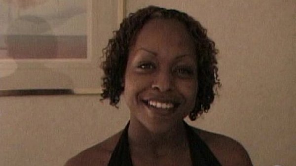 Slut ebony with pierced nipples screws a sex toy