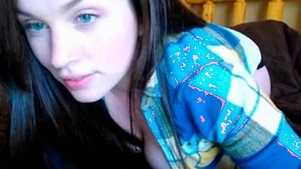 Cute blue eyed brunette showing her tits