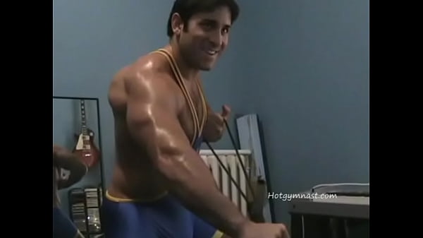 Wrestling Stud in spandex playing with cock