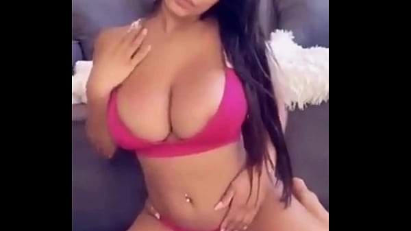 Sexy girl showing off boobs