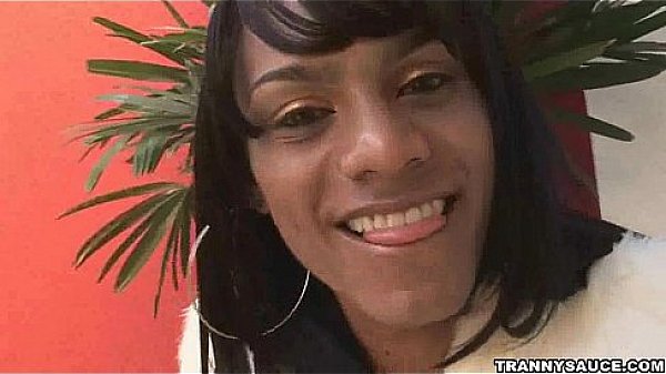 Foxy ebony shemale jerking her hard cock poolside