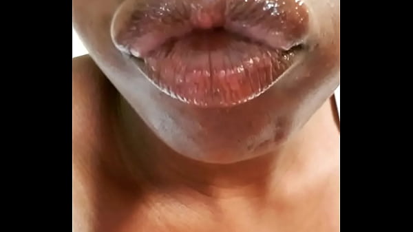 Ebony glossy lips on display