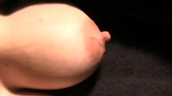 Watch Her Nipples Growing Erect and Dripping Milk  