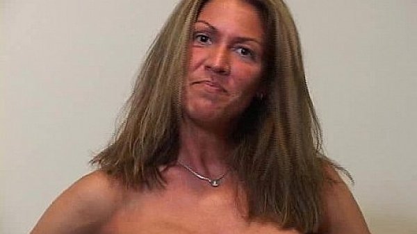 Sexily exercising by squatting as part of teasing men