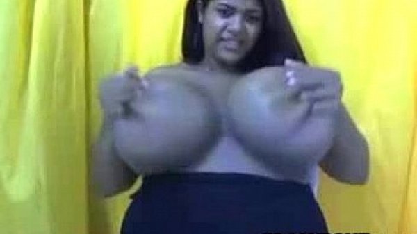 Black babe with mega tits teasing