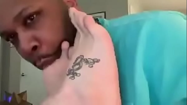 Submissive Black  suck a White dominant feet