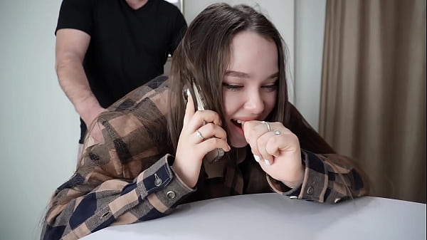 Fucking my stepsister while she's on the phone.