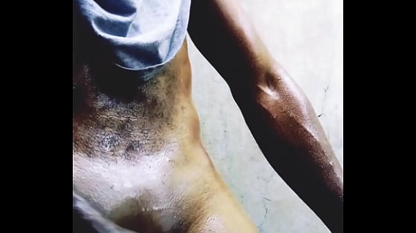 African horny man getting oiled-up, giving his dick a GOOD RUB