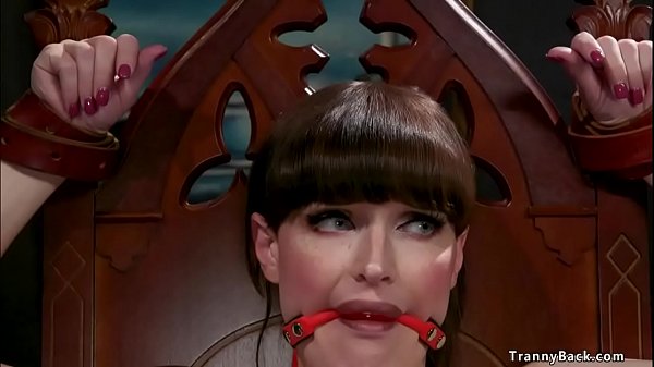 Brunette shemale Natalie Mars is strapped in chair and cock tormented by elder headmaster Dale Savage then anal fucked in bondage