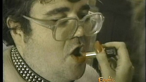 Fat dude sucks on a sex toy and has his asshole hammered