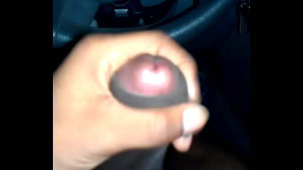 Stroking dick in car