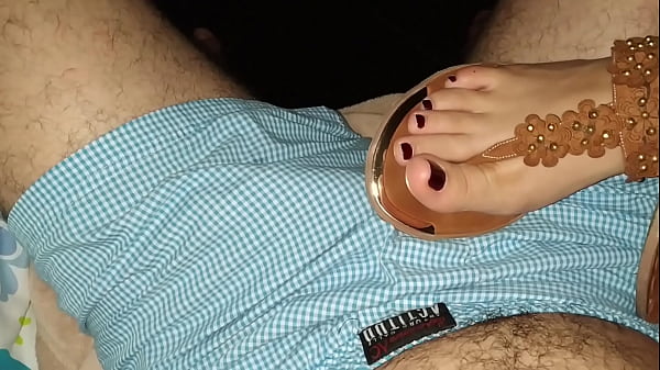 Massage of pretty feet with sandals and cumshot on the tender hand of my roommate who had her period and we couldn't fuck  