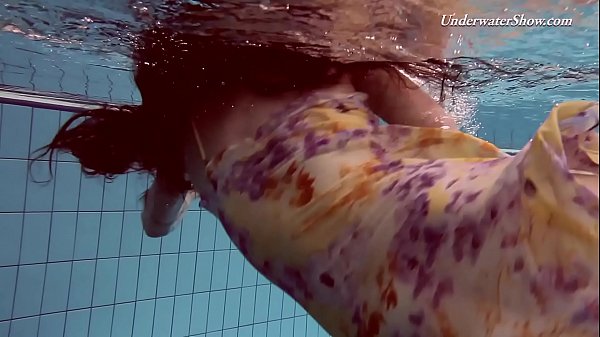 Skinny tight shaved pussy in the pool