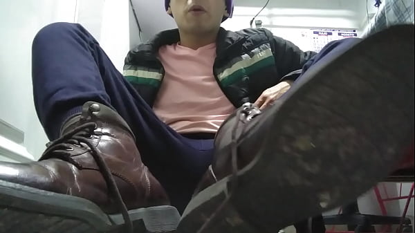 Black socks and male feet in leather