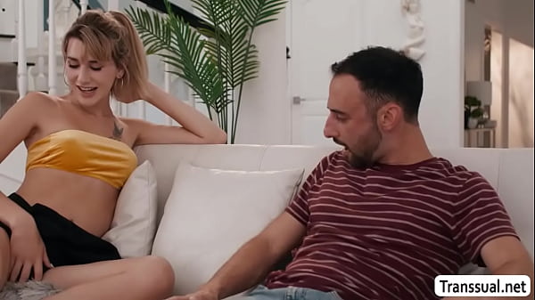 Blonde shemale Jayne Calloway gives tired Jacob Coldwate a passionate blowjob on the couch.After that,she lets him lick her asshole