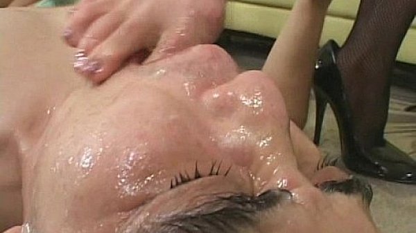 Mistress dominates slave by feet as he masturbates