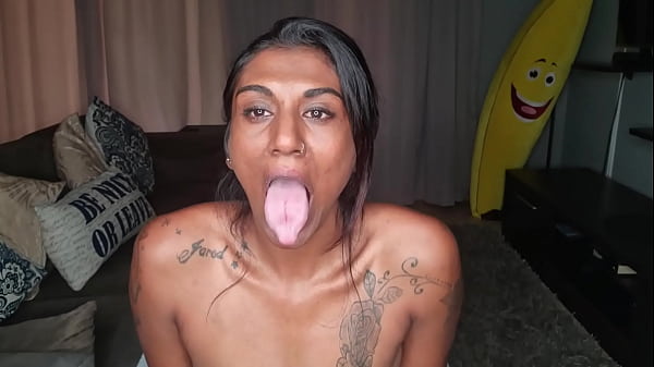 Sitting on the couch displaying my desi boobs, spit dripping down my tits as a constantly stick out my pink tongue  