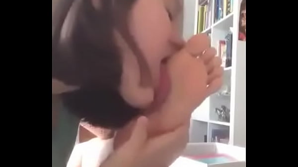 Girl licking her foot