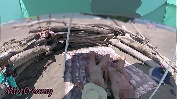 #2 Voyeur watching us while my hot wife masturbating and cumshot cock in nudist beach public - Risky Public Sex - Caught Handjob by stranger - MissCreamy